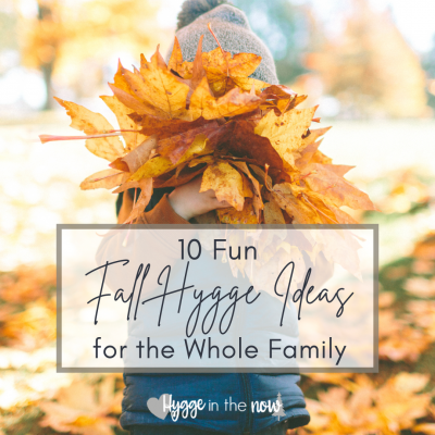 child holding fall leaves